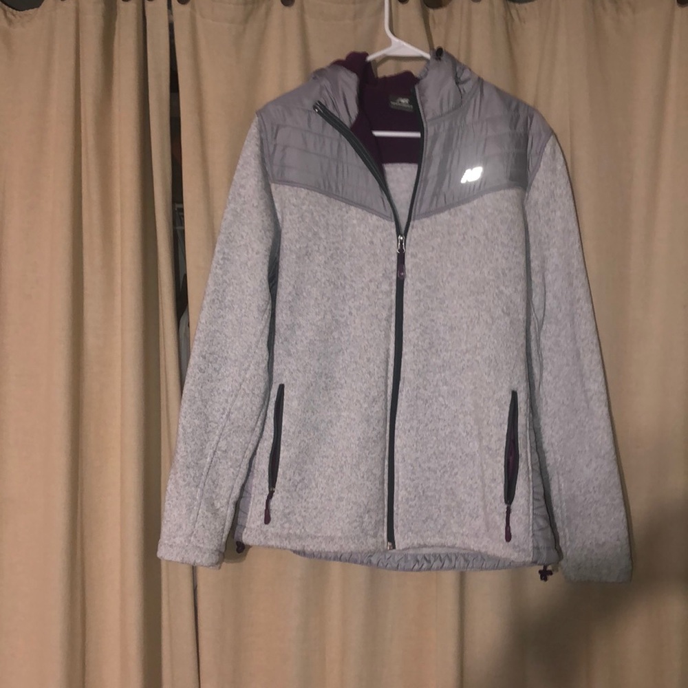 Never worn, New Balance Zip Up Jacket with hood.